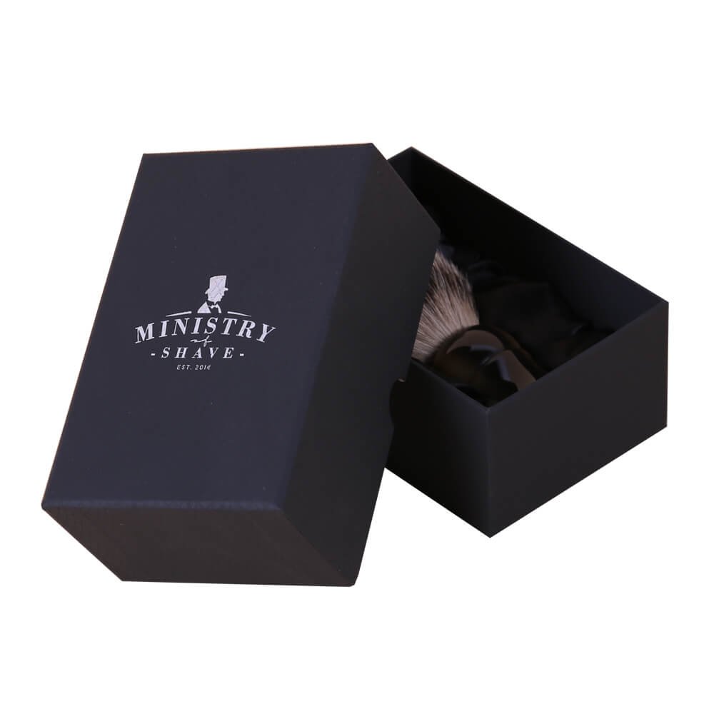 Elegant black rigid box with silver foil logo for 'Ministry of Shave