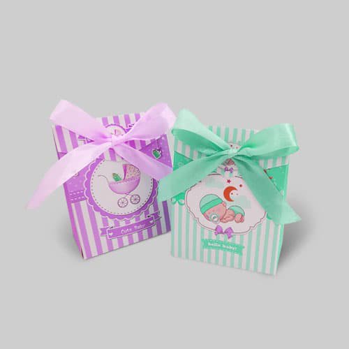 Custom baby gift boxes with pastel stripes, ribbon bows, and cute baby-themed designs