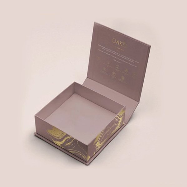 Luxury rigid box with elegant gold marbled accents and inside branding