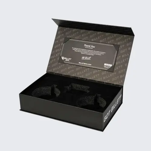 Premium black custom packaging box with foam inserts and branded interior design